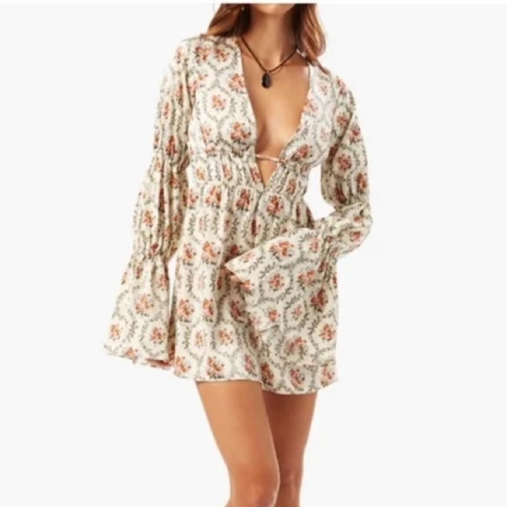 We wore what floral long sleeve mini dress